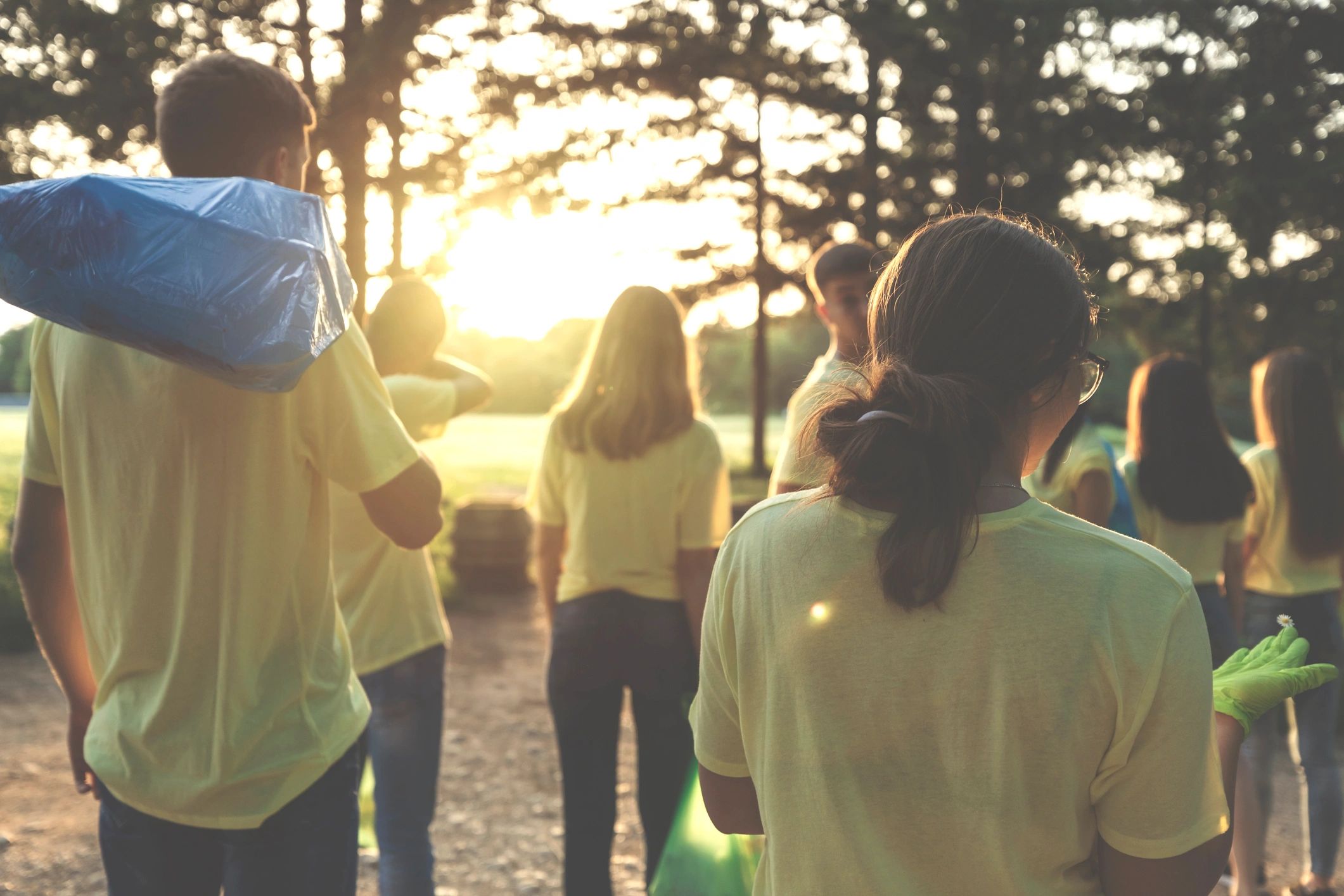Teen volunteers working together in the community