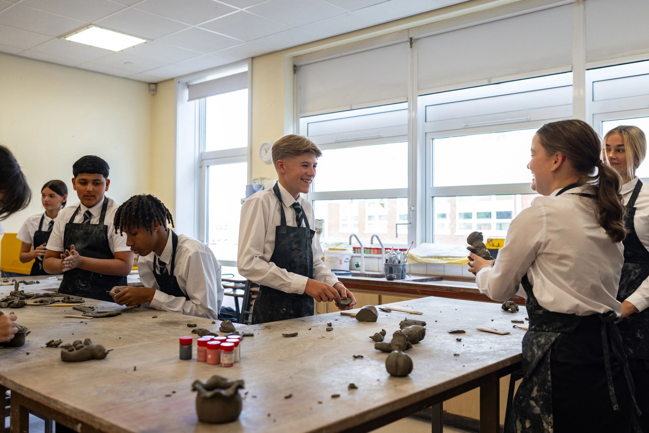 Youth participating in a guided art activity